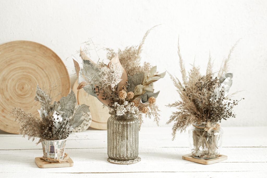 A beautiful arrangement of dried flowers in various colors, adding a rustic and timeless charm to the home decor